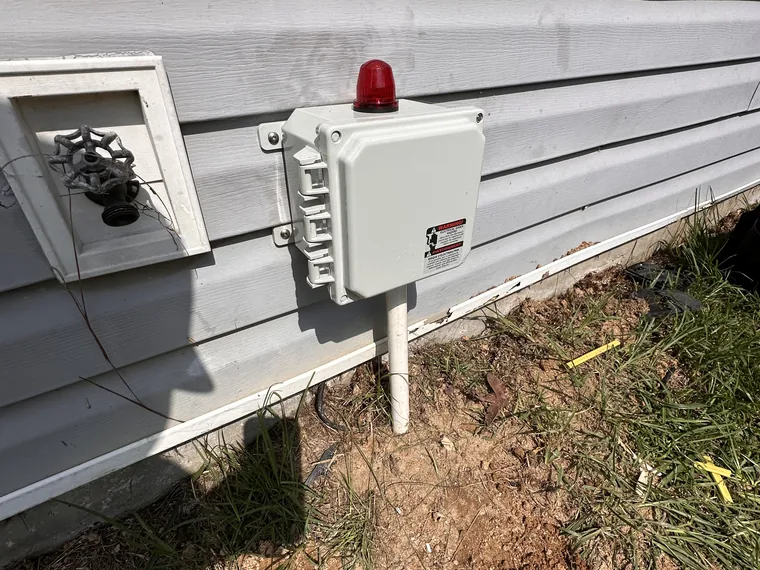 Weather-tight septic alarm panel install by SepticRooter™ in Metro Atlanta, GA