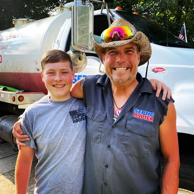 Rob and his son by the truck
