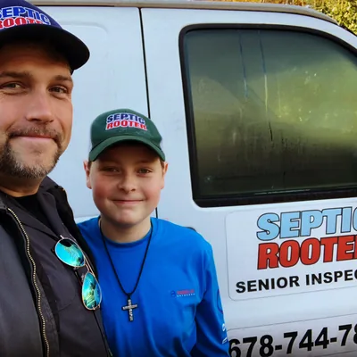 Rob and his son by the van