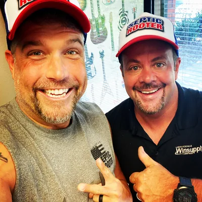 Two happy technicians