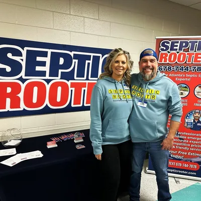 Rob and Beth at a SepticRooter trade show booth