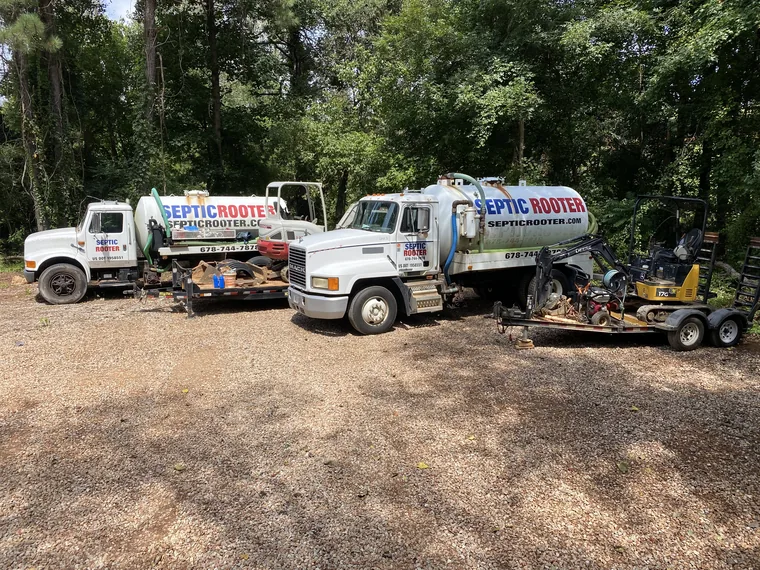 Multiple SepticRooter pump trucks and equipment staged for Metro Atlanta calls