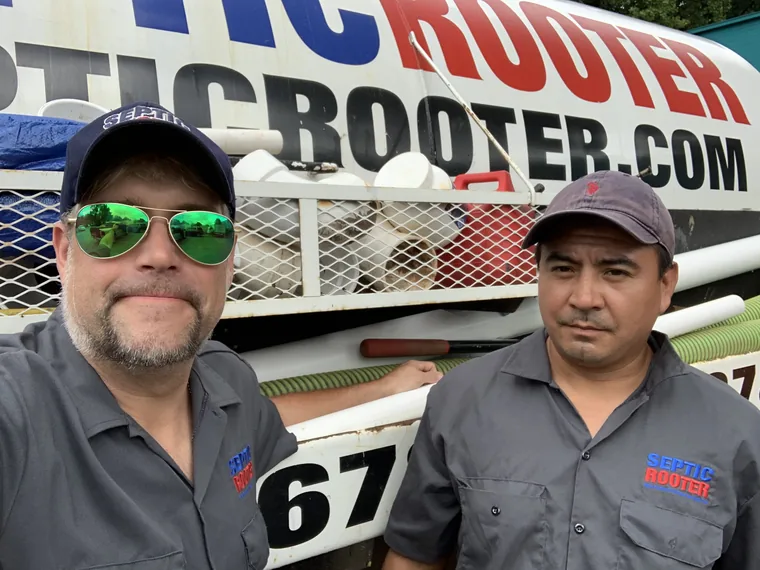 Rob Simmons and crew member in front of SepticRooter truck