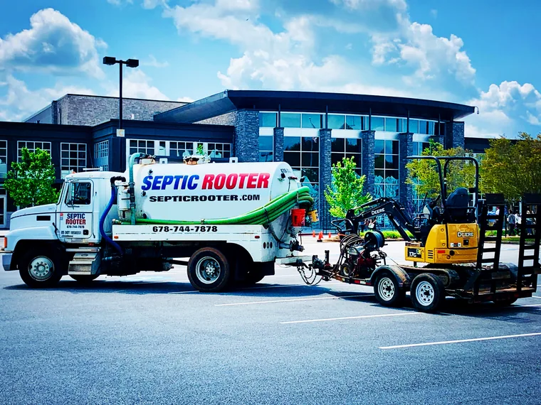 Full SepticRooter fleet including pump trucks and excavators
